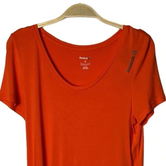 REEBOK. Orange activewear tee shirt . Logos ,scoop neckline , longer cap sleeve - Picture 2 of 7